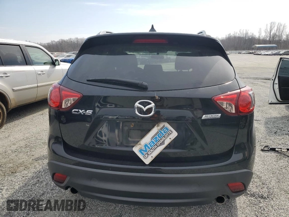 2016 Mazda CX-5 Touring with VIN JM3KE2CY1G0654434, listed as a Copart auction lot 48974115 with 83,977 mi miles and Salvage Title. Bid and sale history available at carsss.com. Image 6.
