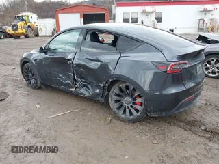 2024 Tesla Model Y Performance with VIN 7SAYGDEF7RF020203, listed as a IAAI auction lot 41639077 with 14,493 mi miles and . Bid and sale history available at DreamBid. Image 3.