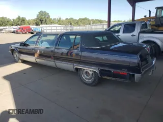 1996 Cadillac Fleetwood z VIN 1G6DW52P2TR710009, wystawiony jako Copart lot #67530934 z przebiegiem 127 910 mil mil oraz Tytuł czysty. Historia ofert i sprzedaży dostępna na DreamBid. Obrazek 2.