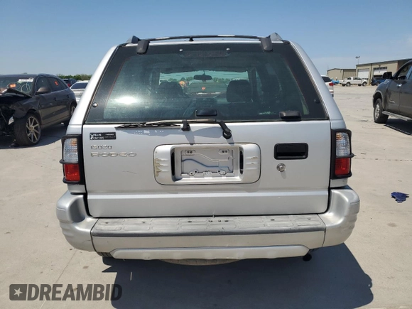 2001 Isuzu Rodeo S with VIN 4S2CK58W814358541, listed as a Copart auction lot 53212545 with 153,880 mi miles and Clean title. Bid and sale history available at DreamBid. Image 6.