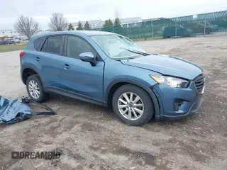 2016 Mazda CX-5 Touring with VIN JM3KE4CY8G0858045, listed as a IAAI auction lot 41941537 with 103,532 mi miles. Bid and sale history available at carsss.com. Image 1.
