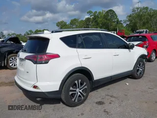 2017 Toyota RAV4 LE with VIN JTMZFREV3HJ143416, listed as a IAAI auction lot 41861981 with 115,241 mi miles and . Bid and sale history available at DreamBid. Image 4.