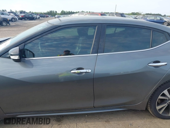 2016 Nissan Maxima SL with VIN 1N4AA6AP8GC430051, listed as a IAAI auction lot 41983059 with 166,786 mi miles and . Bid and sale history available at DreamBid. Image 14.