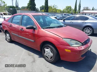 2003 Ford Focus LX with VIN 1FAFP33PX3W241880, listed as a IAAI auction lot 42564941 with 99,468 mi miles and . Bid and sale history available at DreamBid. Image 1.