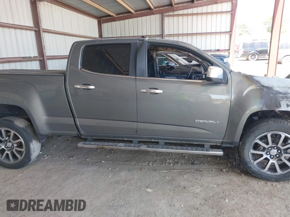 2017 GMC Canyon 4WD Denali z VIN 1GTG6EEN4H1237577, wystawiony jako IAAI lot #42261280 z przebiegiem Nie podano mil oraz . Historia ofert i sprzedaży dostępna na DreamBid. Obrazek 12.