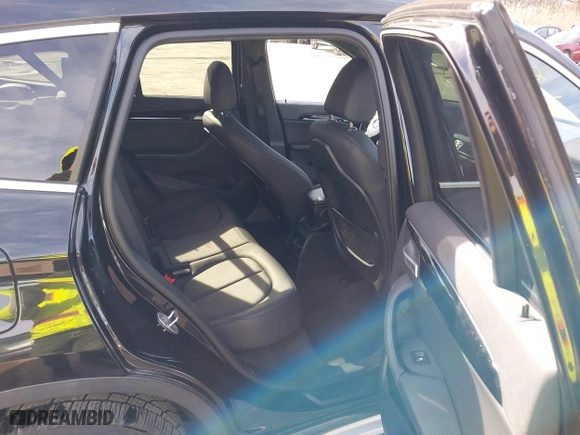 2019 BMW X1 xDrive28i with VIN WBXHT3C51K5L89758, listed as a IAAI auction lot 41535652 with 96,612 mi miles. Bid and sale history available at carsss.com. Image 8.