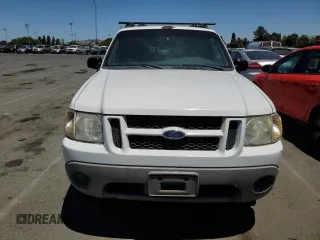 2001 Ford Explorer Sport z VIN 1FMYU60E41UA39699, wystawiony jako Copart lot #62336524 z przebiegiem 223 772 mil mil oraz Szkody całkowita. Historia ofert i sprzedaży dostępna na DreamBid. Obrazek 5.