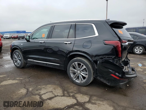 2022 Cadillac XT6 Premium Luxury z VIN 1GYKPDRSXNZ161744, wystawiony jako Copart lot #54901995 z przebiegiem 24 994 mil mil oraz Szkoda całkowita • Salvage title. Historia ofert i sprzedaży dostępna na DreamBid. Obrazek 2.
