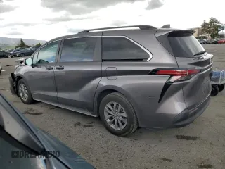 2021 Toyota Sienna LE with VIN 5TDBRKEC3MS004866, listed as a Copart auction lot 48239265 with 77,356 mi miles and Salvage Title. Bid and sale history available at carsss.com. Image 2.