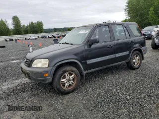 1999 Honda CR-V EX z VIN JHLRD186XXC063502, wystawiony jako Copart lot #57711235 z przebiegiem 337 037 mil mil oraz Czysty tytuł • Clean title. Historia ofert i sprzedaży dostępna na DreamBid. Obrazek 1.