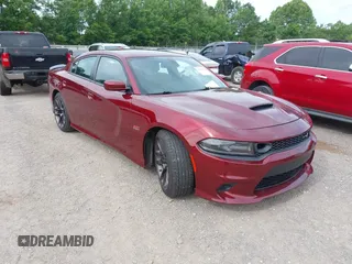 2020 Dodge Charger Scat Pack z VIN 2C3CDXGJ9LH112566, wystawiony jako IAAI lot #42330916 z przebiegiem 143 710 mil mil oraz . Historia ofert i sprzedaży dostępna na DreamBid. Obrazek 1.