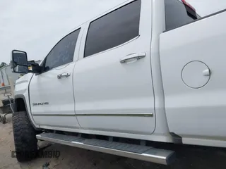 2017 GMC Sierra 2500HD Denali with VIN 1GT12UEG3HF117771, listed as a IAAI auction lot 42334696 with 140,999 mi miles and . Bid and sale history available at DreamBid. Image 13.