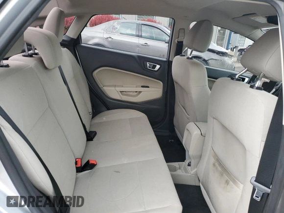 2016 Ford Fiesta SE z VIN 3FADP4BJXGM149197, wystawiony jako Copart lot #57100405 z przebiegiem 106 429 mil mil oraz Nie do naprawy • Non repairable. Historia ofert i sprzedaży dostępna na DreamBid. Obrazek 10.