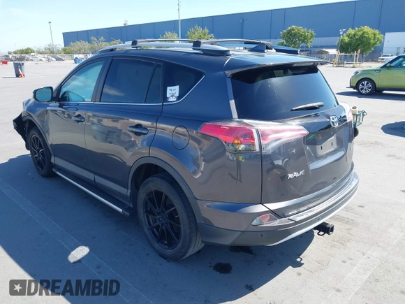 2016 Toyota RAV4 SE with VIN 2T3NFREV6GW272166, listed as a IAAI auction lot 42371973 with 123,509 mi miles and . Bid and sale history available at DreamBid. Image 3.