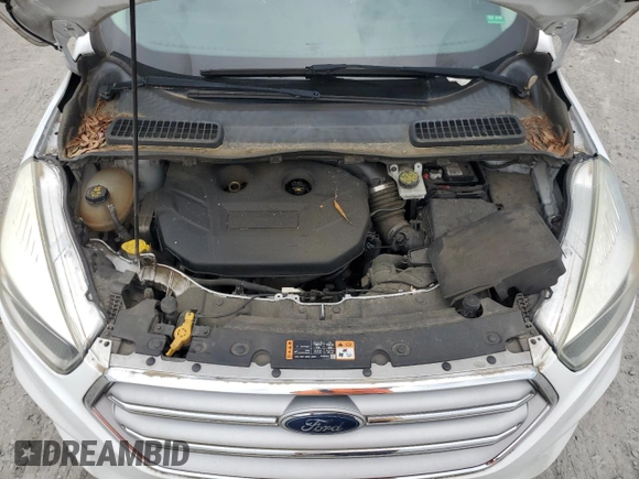 2017 Ford Escape SE z VIN 1FMCU0G99HUA75866, wystawiony jako Copart lot #57274785 z przebiegiem 132 874 mil mil oraz Czysty tytuł • Clean title. Historia ofert i sprzedaży dostępna na DreamBid. Obrazek 12.