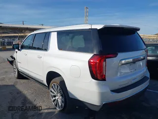 2023 GMC Yukon XL Denali with VIN 1GKS2JKT0PR478011, listed as a IAAI auction lot 41596312 with 21,286 mi miles. Bid and sale history available at carsss.com. Image 3.