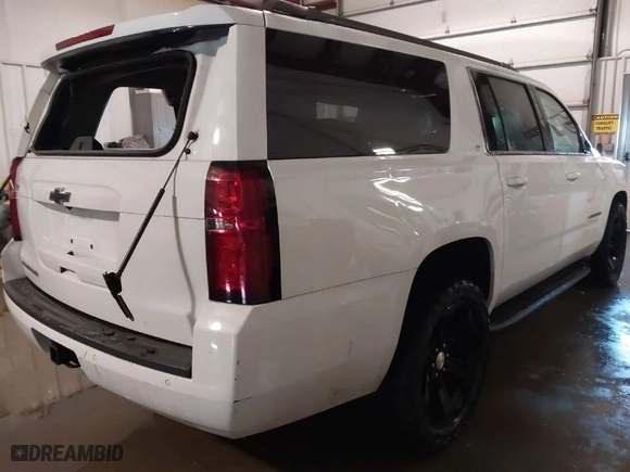 2017 Chevrolet Suburban LT with VIN 1GNSKHKCXHR328405, listed as a IAAI auction lot 41353035 with NaN miles. Bid and sale history available at carsss.com. Image 4.