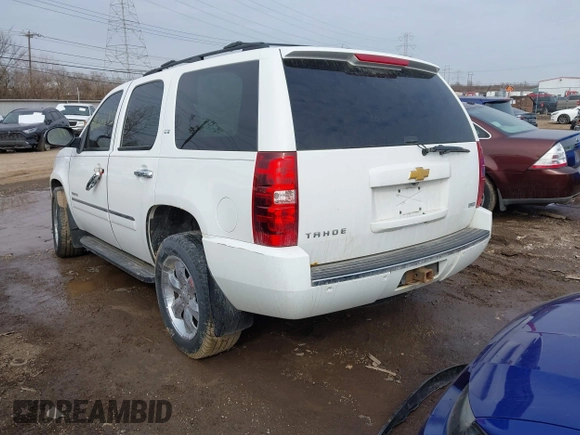 2009 Chevrolet Tahoe LTZ with VIN 1GNFK33079R293963, listed as a IAAI auction lot 41662695 with 185,408 mi miles and . Bid and sale history available at DreamBid. Image 3.