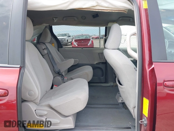 2014 Toyota Sienna LE AAS with VIN 5TDKK3DC4ES462090, listed as a IAAI auction lot 41942354 with 215,814 mi miles. Bid and sale history available at carsss.com. Image 8.