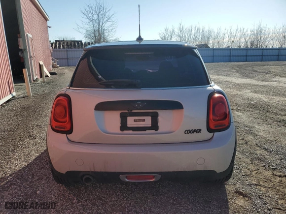 2017 MINI Hardtop 2 Door Cooper with VIN WMWXP5C53H3B77988, listed as a Copart auction lot 52147565 with 130,809 mi miles and Clean Title. Bid and sale history available at carsss.com. Image 6.