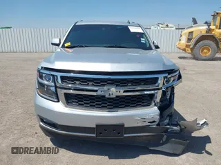 2015 Chevrolet Tahoe LT with VIN 1GNSCBKC6FR303850, listed as a IAAI auction lot 42254115 with 147,856 mi miles and . Bid and sale history available at DreamBid. Image 12.
