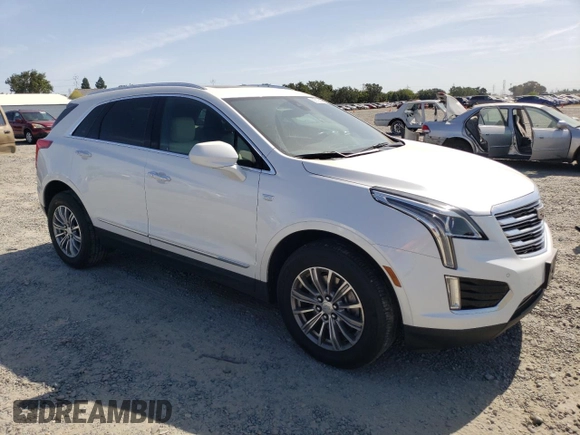 2017 Cadillac XT5 Luxury AWD with VIN 1GYKNDRS0HZ180703, listed as a Copart auction lot 58793895 with 30,339 mi miles and Salvage title. Bid and sale history available at DreamBid. Image 4.