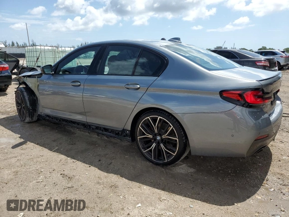 2023 BMW 5 Series 530i with VIN WBA53BH02PCM55841, listed as a Copart auction lot 58391765 with 6,947 mi miles and Salvage title. Bid and sale history available at DreamBid. Image 2.
