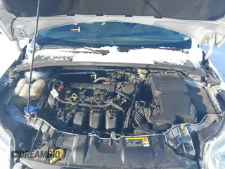 2012 Ford Focus SE with VIN 1FAHP3F27CL457213, listed as a IAAI auction lot 41303904 with 215,044 mi miles and . Bid and sale history available at DreamBid. Image 10.