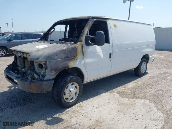 2013 Ford Econoline Cargo Van Commercial with VIN 1FTNE1EW6DDA69266, listed as a IAAI auction lot 42040253 with 1 mi miles. Bid and sale history available at carsss.com. Image 2.