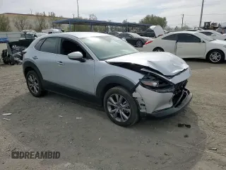 2021 Mazda CX-30 Select with VIN 3MVDMABLXMM256327, listed as a Copart auction lot 51185235 with 76,630 mi miles and Salvage Title. Bid and sale history available at DreamBid. Image 14.
