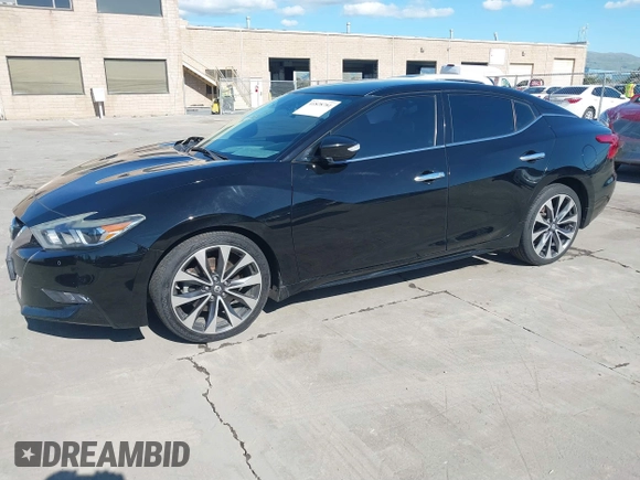 2016 Nissan Maxima SL with VIN 1N4AA6AP9GC448087, listed as a IAAI auction lot 41828781 with 99,436 mi miles and . Bid and sale history available at DreamBid. Image 2.