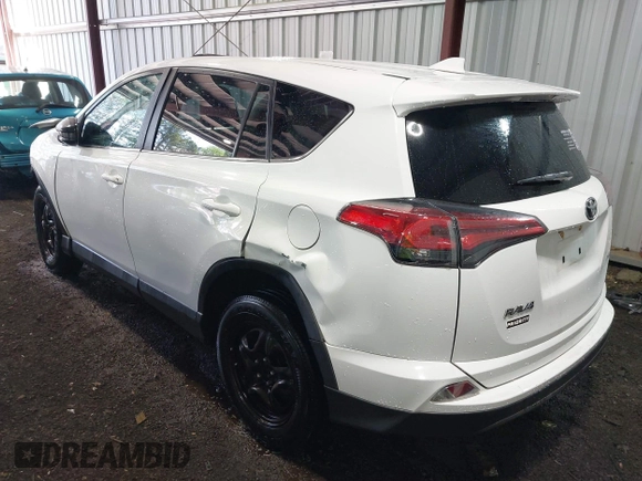 2018 Toyota RAV4 LE with VIN 2T3ZFREV6JW505455, listed as a IAAI auction lot 42052207 with 122,745 mi miles. Bid and sale history available at carsss.com. Image 3.