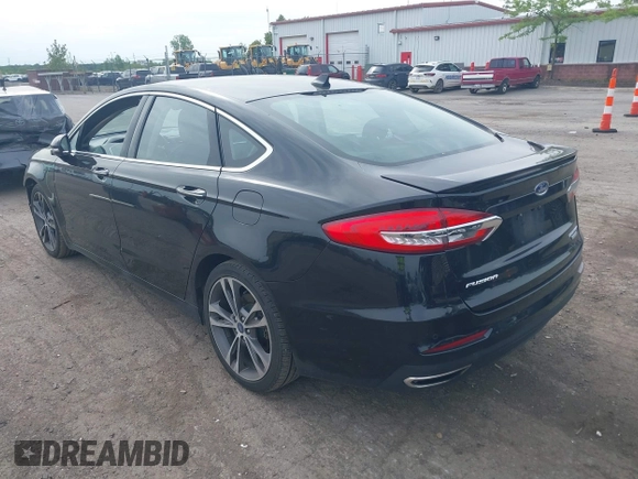 2020 Ford Fusion Titanium with VIN 3FA6P0K94LR117138, listed as a IAAI auction lot 42345819 with 88,117 mi miles and . Bid and sale history available at DreamBid. Image 3.