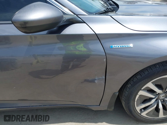 2020 Honda Accord with VIN 1HGCV3F11LA015901, listed as a IAAI auction lot 42022659 with 131,865 mi miles and . Bid and sale history available at DreamBid. Image 17.