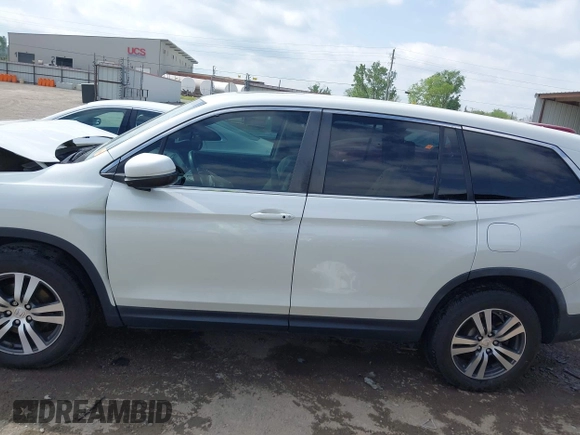 2017 Honda Pilot EX-L with VIN 5FNYF6H5XHB005000, listed as a IAAI auction lot 42039832 with 141,592 mi miles and . Bid and sale history available at DreamBid. Image 15.