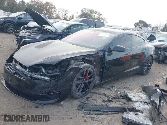 2022 Tesla Model S Plaid with VIN 5YJSA1E6XNF460235, listed as a IAAI auction lot 40951359 with 18,922 mi miles and . Bid and sale history available at DreamBid. Image 19.