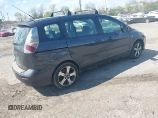 2006 Mazda 5 Sport with VIN JM1CR293460105113, listed as a IAAI auction lot 42035735 with 140,325 mi miles. Bid and sale history available at carsss.com. Image 4.