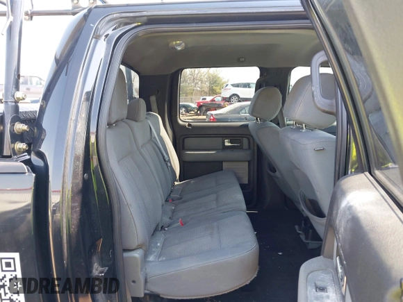 2014 Ford F-150 XL with VIN 1FTFW1EF0EFC98677, listed as a IAAI auction lot 41762191 with 212,626 mi miles. Bid and sale history available at carsss.com. Image 8.