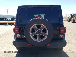 2020 Jeep Wrangler Unlimited Sahara with VIN 1C4HJXEGXLW209908, listed as a Copart auction lot 49409625 with 73,352 mi miles and Salvage title. Bid and sale history available at DreamBid. Image 6.
