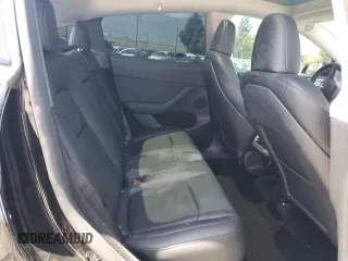 2024 Tesla Model Y Long Range with VIN 7SAYGDEE0RF123793, listed as a Copart auction lot 57177305 with 20,053 mi miles and Salvage title. Bid and sale history available at DreamBid. Image 11.