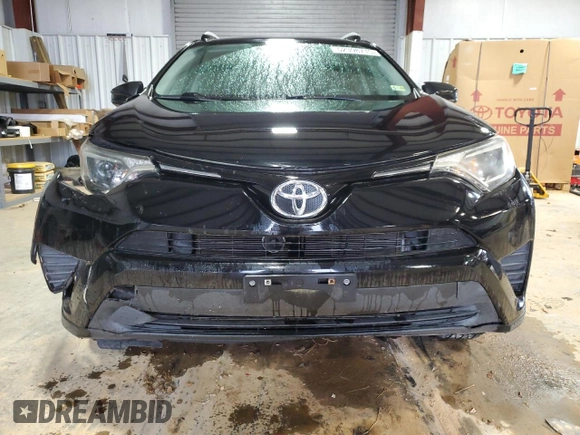 2016 Toyota RAV4 LE with VIN 2T3BFREV3GW495087, listed as a Copart auction lot 52398715 with 43,024 mi miles and Salvage Title. Bid and sale history available at DreamBid. Image 5.