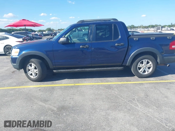 2007 Ford Explorer Sport Trac XLT z VIN 1FMEU31K57UA25387, wystawiony jako IAAI lot #41839716 z przebiegiem 199 004 mil mil oraz . Historia ofert i sprzedaży dostępna na DreamBid. Obrazek 6.
