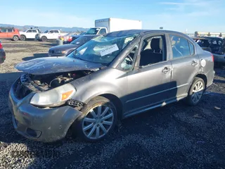 2010 Suzuki SX4 with VIN JS2YC5A40A6300053, listed as a IAAI auction lot 41392061 with 114,863 mi miles and . Bid and sale history available at DreamBid. Image 17.