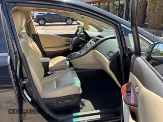 2010 Lexus HS 250h with VIN JTHBB1BA1A2020910, listed as a Copart auction lot 57009775 with 263,515 mi miles and Clean Title. Bid and sale history available at DreamBid. Image 5.