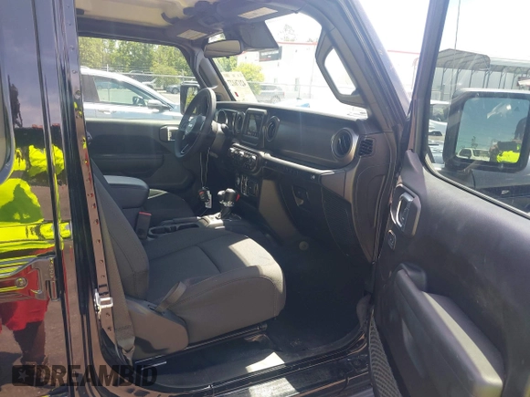 2023 Jeep Wrangler Sport S with VIN 1C4HJXDN5PW671167, listed as a IAAI auction lot 42176127 with 1,230 mi miles and . Bid and sale history available at DreamBid. Image 5.