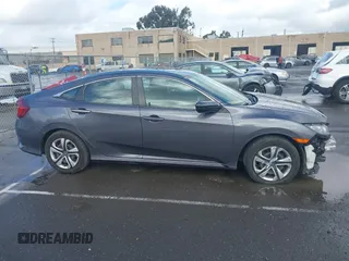 2017 Honda Civic LX z VIN 2HGFC2F50HH540361, wystawiony jako IAAI lot #41809159 z przebiegiem 96 590 mil mil oraz . Historia ofert i sprzedaży dostępna na DreamBid. Obrazek 14.