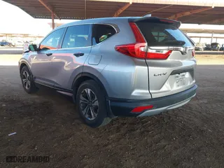 2019 Honda CR-V LX with VIN 2HKRW5H34KH420447, listed as a IAAI auction lot 41616151 with 104,373 mi miles. Bid and sale history available at carsss.com. Image 3.