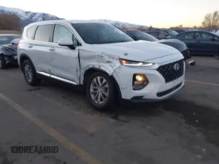 2019 Hyundai Santa Fe SE with VIN 5NMS23AD9KH077362, listed as a IAAI auction lot 41890584 with 132,476 mi miles. Bid and sale history available at carsss.com. Image 1.