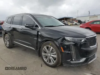 2021 Cadillac XT6 Premium Luxury z VIN 1GYKPERS0MZ181151, wystawiony jako Copart lot #78808104 z przebiegiem 31 697 mil mil oraz Szkoda całkowita • Salvage title. Historia ofert i sprzedaży dostępna na DreamBid. Obrazek 4.