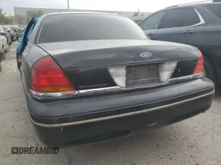 2000 Ford Crown Victoria LX с VIN 2FAFP74W1YX130479, выставлен на аукционе Copart как лот 53387815 с пробегом 166 089 миль миль и На запчасти • Non repairable. История ставок и продаж доступна на DreamBid. Изображение 6.